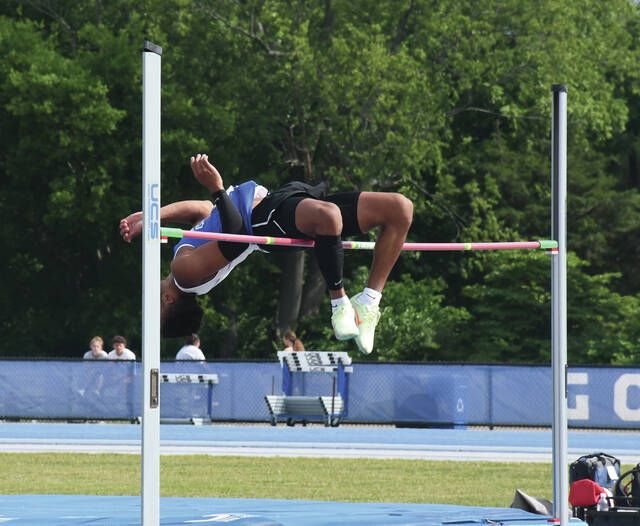 
			
				                                Mason County’s Anthony Bozeman competes in the high jump during the KHSAA Class 2A state track and field championships, Friday, in Lexington. (Evan Dennison, The Ledger Independent)
 
			
		
