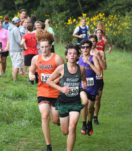 Over 300 varsity runners hit the course at Mason County XC Invitational