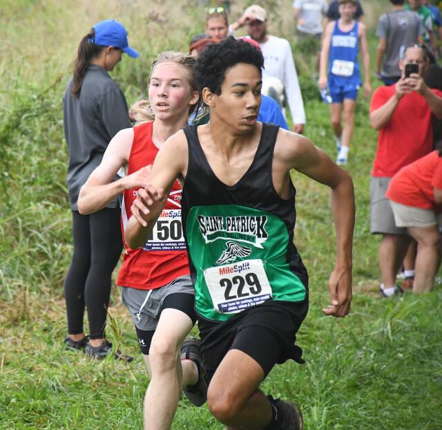 Over 300 varsity runners hit the course at Mason County XC Invitational