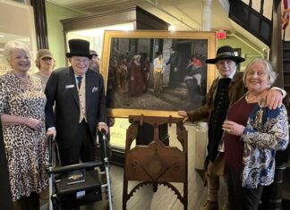 
			
				                                Kentucky Gateway Museum Center staff pose with artist Steve White beside a painting depicting Marquis de Lafayette’s visit to Maysville.
                                 Rachel Adkins/The Ledger Independent

			
		